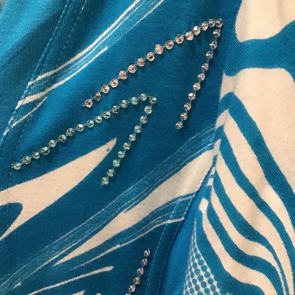 Turquoise and white jacket - Picture 3 of 5